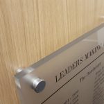 Acrylic plaque for The Dorchester (close-up) - Mirage Signs