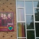 Amesbury CE Primary School building sign close up